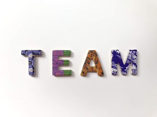 Team in Colorful Alphabets